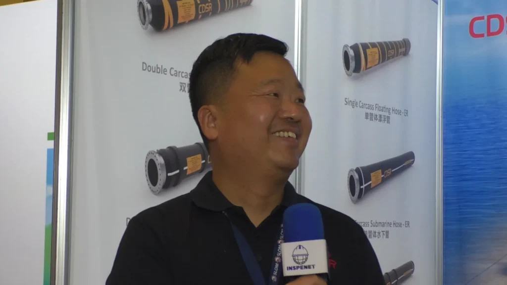 Tony Zhou, commercial and product manager at Jiangsu CDSR Technology Co., during an interview at the SLOM 2025 event, talking about the company's expansion into the Latin American market.