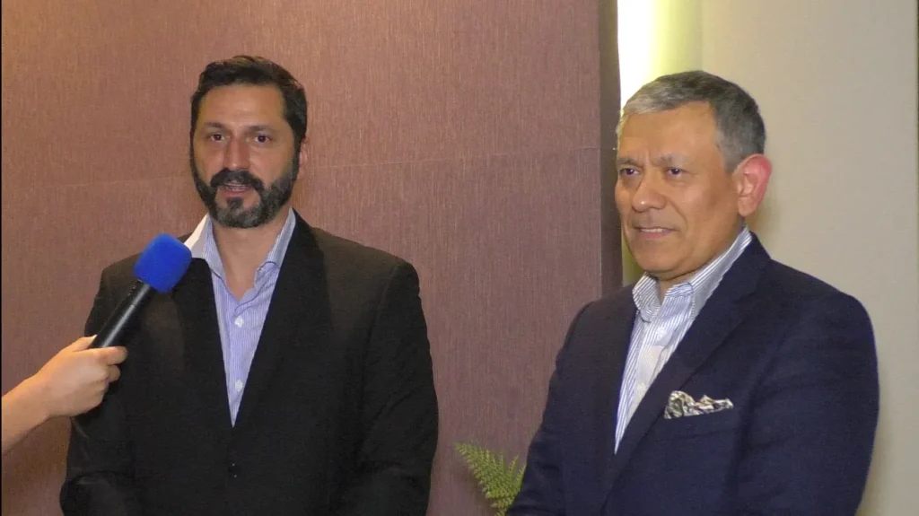 Two representatives from SLOM and OSRL are interviewed during the regional conference in Panama, focused on oil spills preparedness and response.